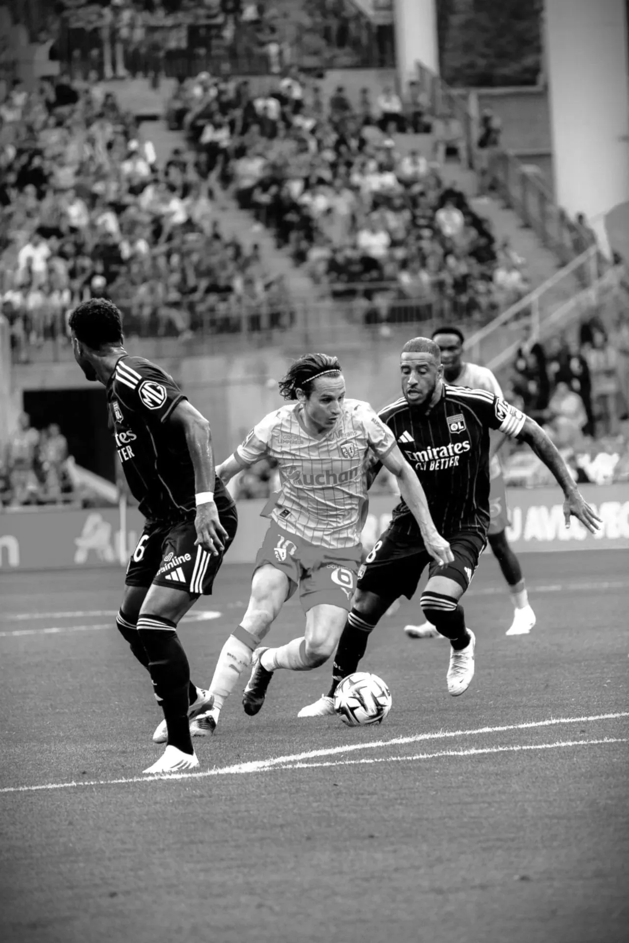 An RC Lens professional player in a match