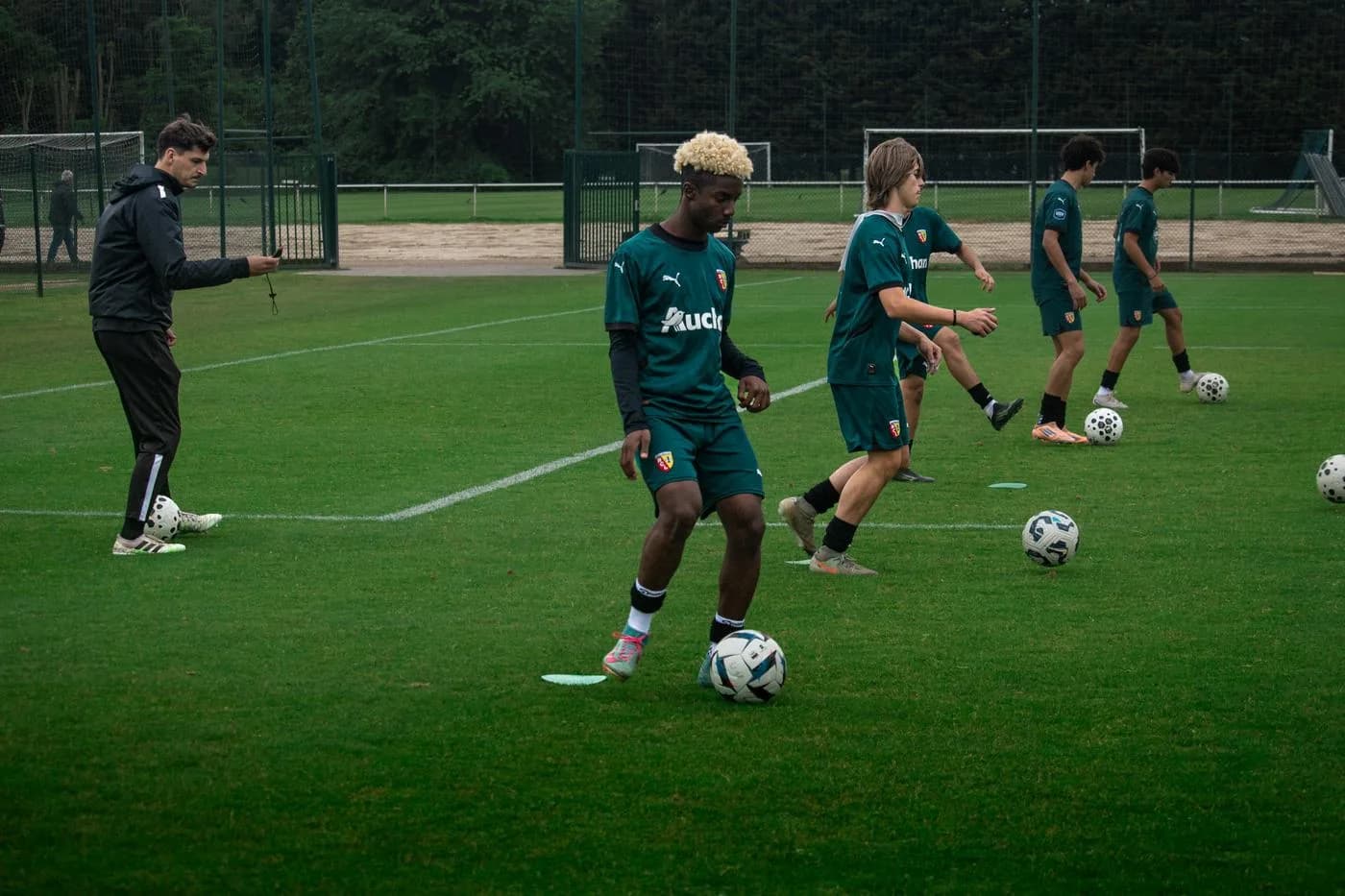 Players training together in a small group session